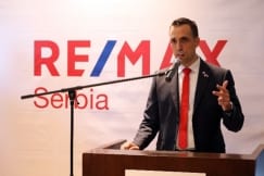 US Ambassador Kyle Scott and Minister Đorđević at the opening of the RE/MAX Serbia